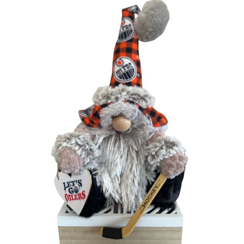 nhl-edmonton-oilers-themed-gnome-with-unique-design-holds-a-hockey-stick